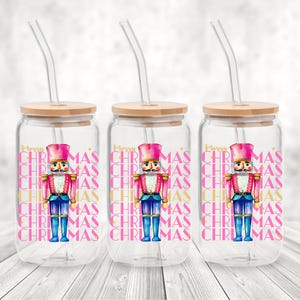 Hand-painted watercolor nutcracker soldier Christmas PNG design in vibrant pink, gold, and blue with festive stars and layered “Merry Christmas” lettering. Perfect for holiday shirts, Christmas party outfits, Nutcracker ballet gifts, winter home décor, festive wall art, seasonal apparel, cozy holiday decorations, and Christmas gift ideas for women and kids.