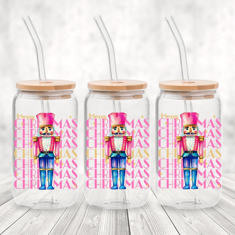 Hand-painted watercolor nutcracker soldier Christmas PNG design in vibrant pink, gold, and blue with festive stars and layered “Merry Christmas” lettering. Perfect for holiday shirts, Christmas party outfits, Nutcracker ballet gifts, winter home décor, festive wall art, seasonal apparel, cozy holiday decorations, and Christmas gift ideas for women and kids.