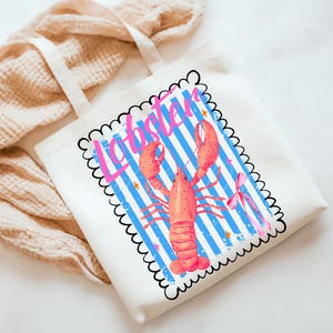 Bold watercolor lobster design with pink bow on nautical blue and white stripes — perfect for coastal cowgirl aesthetic, seafood lovers, Maine lobster festival gifts, retro summer beach vibes, ocean-themed apparel, and girly cottagecore fans. Trendy crustacean print for quirky fashion, East Coast preppy style, Y2K nautical chic, or seaside travel souvenir. Great for lobster parties, boating outfits, or colorful graphic tees with a fun foodie twist.