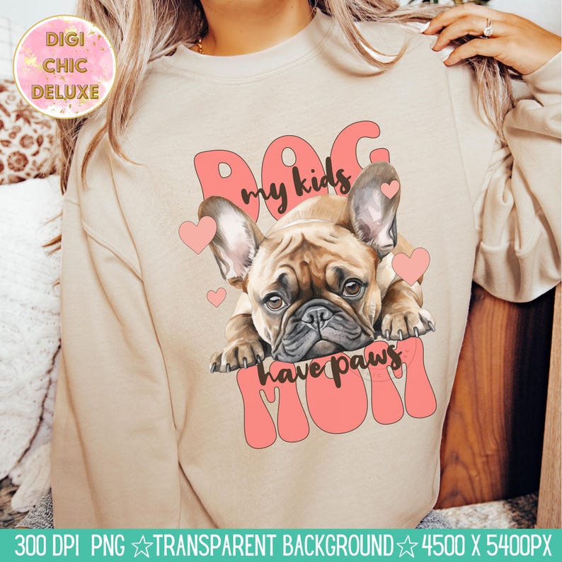 May include: A beige sweatshirt with a pink graphic design featuring a French bulldog puppy with the text "Dog my kids have paws Mom".
