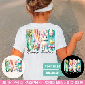 May include: A white t-shirt with a graphic design of a bunny, Easter eggs, carrots, and a boot. The graphic is in a pastel color scheme and says "Happy Easter".