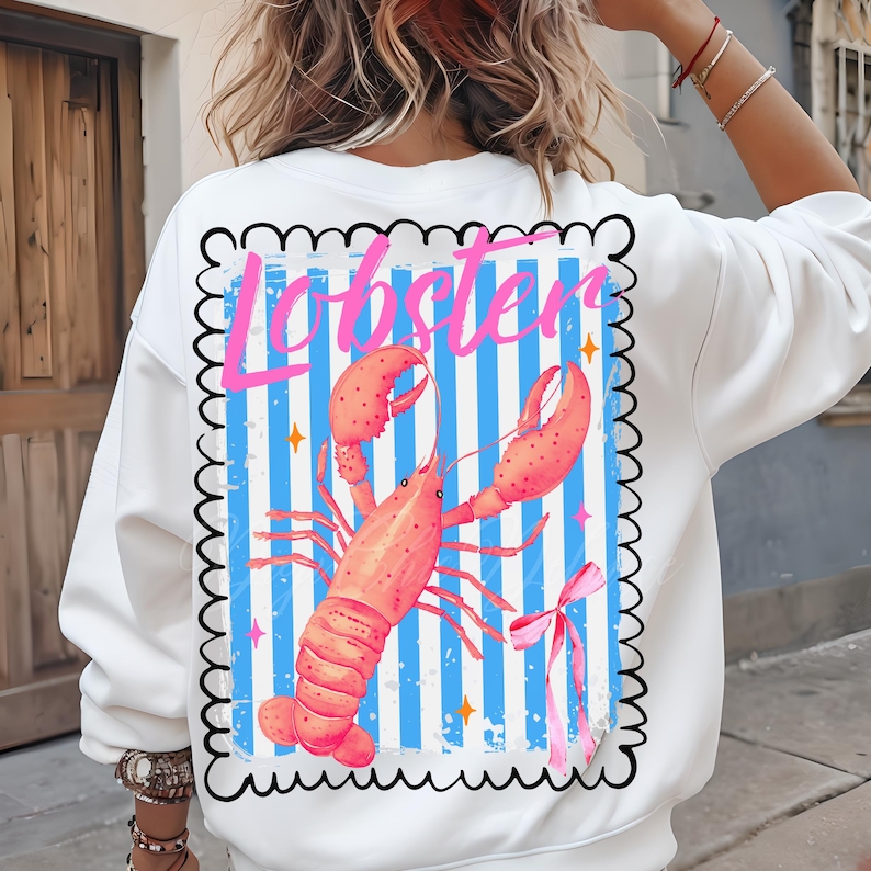 Bold watercolor lobster design with pink bow on nautical blue and white stripes — perfect for coastal cowgirl aesthetic, seafood lovers, Maine lobster festival gifts, retro summer beach vibes, ocean-themed apparel, and girly cottagecore fans. Trendy crustacean print for quirky fashion, East Coast preppy style, Y2K nautical chic, or seaside travel souvenir. Great for lobster parties, boating outfits, or colorful graphic tees with a fun foodie twist.