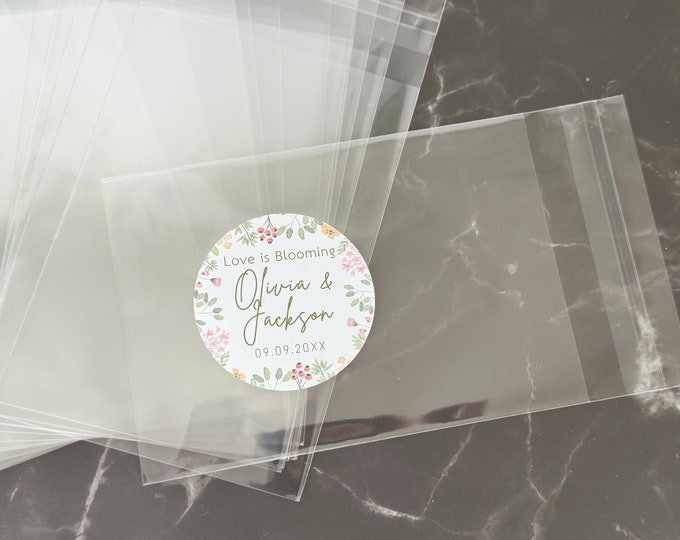 Featured listing image: Love is Blooming Clear Bag Collection: Self-Sealable, Fully Assembled Gifts with Custom Printed 2.5-Inch Circular High Gloss Labels