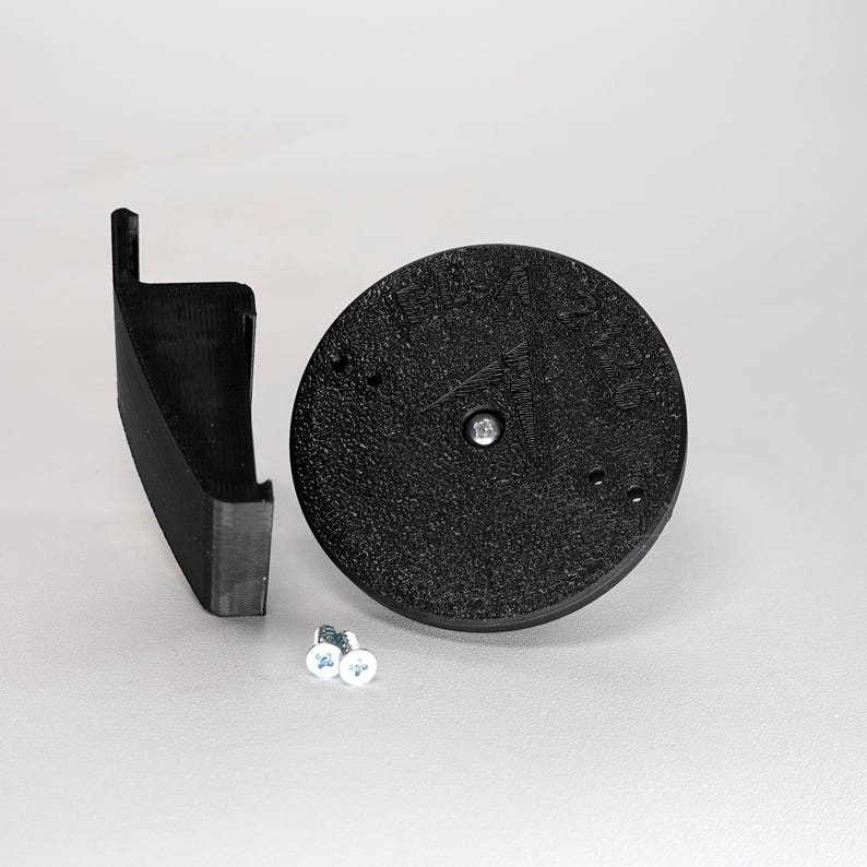 3D-printed Dutch lap siding clip and circular mounting base for a Blink camera, include screws.