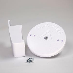 3D-printed traditional vinyl siding clip and circular mounting base for a Blink camera, include screws.