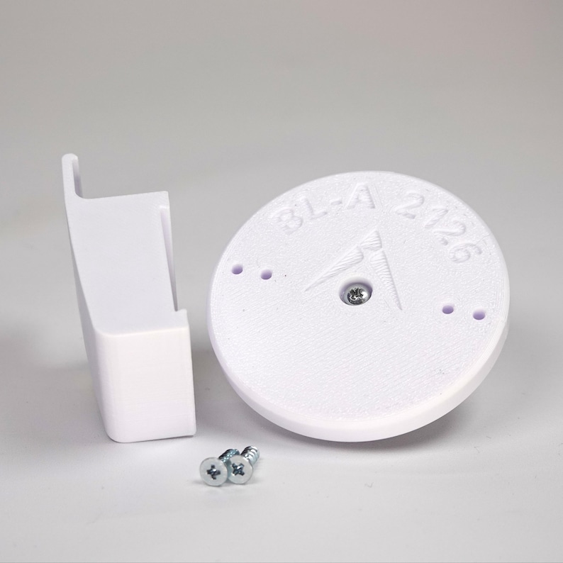 3D-printed traditional vinyl siding clip and circular mounting base for a Blink camera, include screws.