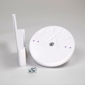 3D-printed plank siding clip and circular mounting base for a Blink camera, include screws.