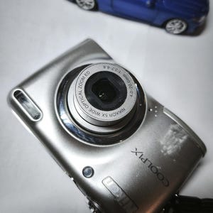Nikon Coolpix L23 - Etsy New Zealand