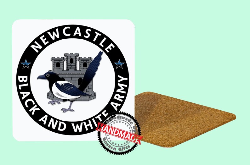 May include: A white square sticker with a black and white magpie bird illustration, the words "NEWCASTLE BLACK AND WHITE ARMY" in a circle, and a cork coaster. The sticker has a castle illustration and star accents. The coaster is rectangular.