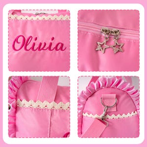 May include: Pink tote bag with the name "Olivia" embroidered in pink script. The bag features a white lace trim, star-shaped zipper pulls, and a matching shoulder strap. The bag is designed for carrying items.
