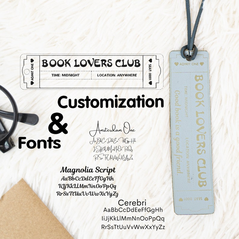 May include: A close-up of a light blue wooden bookmark with the text "Book Lovers Club" and "Good book is a good friend." The bookmark is hanging from a brown leather cord.