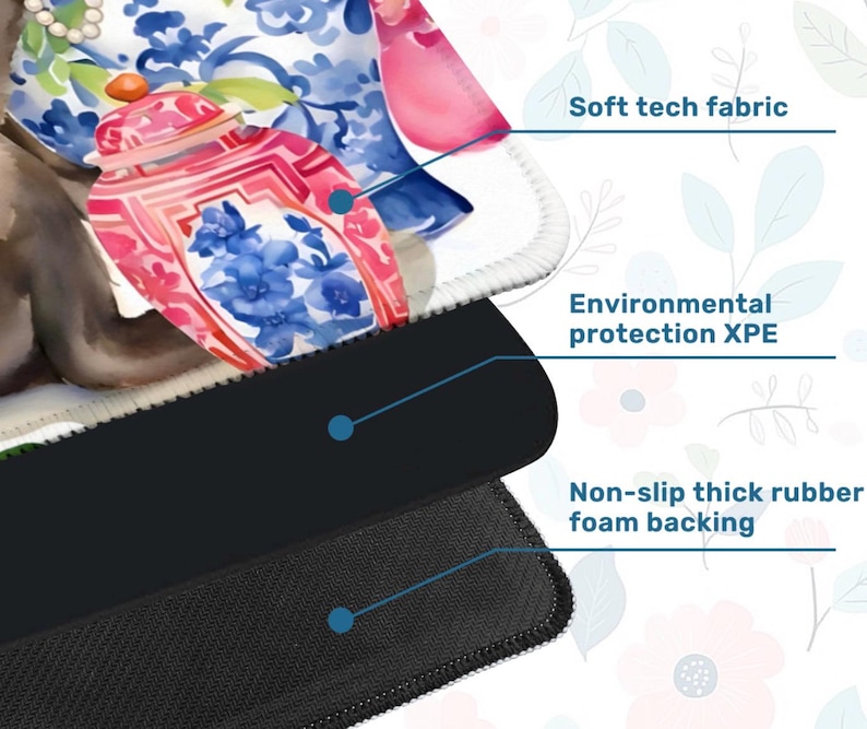 May include: A close-up of a mouse pad with a floral design featuring a pink and blue ginger jar. The mouse pad has a soft tech fabric top, environmental protection XPE, and a non-slip thick rubber foam backing.
