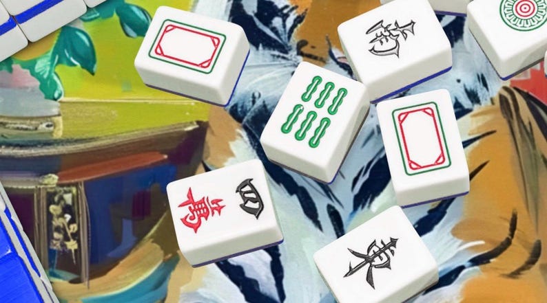 May include: A collection of white Mahjong tiles with various symbols and markings in red, green, and black. The tiles are scattered on a colorful, abstract background, suggesting a game in progress.