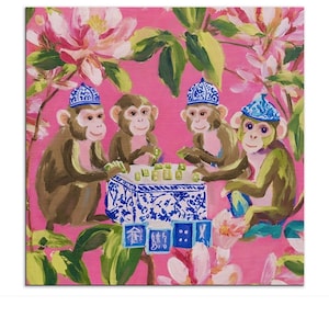 May include: A whimsical painting depicts four monkeys in blue hats playing a game at a blue and white table. The monkeys are brown and green, set against a vibrant pink background with floral and leaf accents.
