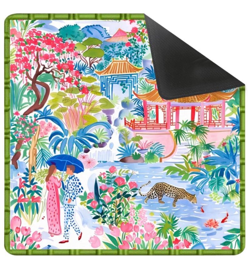 May include: A decorative mat with a colourful Asian garden design. The image shows a couple with an umbrella, a leopard, pagodas, and lush flora. The mat has a green bamboo-style border and a black, non-slip backing.
