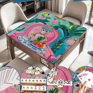 May include: A wooden game table with a colorful, artistic design featuring a monkey, fruit, and floral elements. The table is surrounded by four chairs. The table's surface is a vibrant mix of pink, teal, and green.