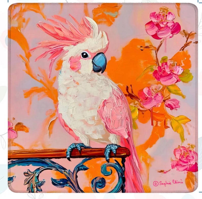 May include: A square mousepad featuring a vibrant painting of a white and pink cockatoo perched on a decorative railing. The background is a blend of orange and pink hues with floral accents. The artist's signature is visible.