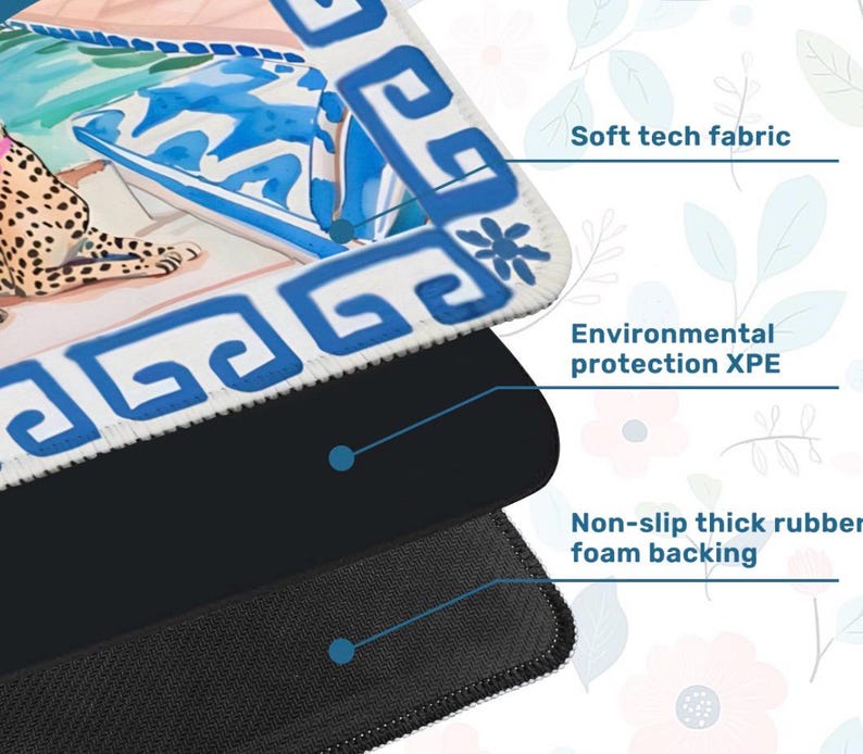 May include: A layered mousepad with a decorative design. The top layer features a colorful illustration with blue and white patterns. The middle layer is black, and the bottom layer is a non-slip, thick rubber foam backing. Text on the mousepad says "Soft tech fabric" and "Environmental protection XPE".
