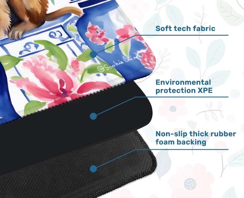 May include: A mouse pad with a floral design featuring pink flowers and blue vases. The mouse pad has a soft tech fabric surface, environmental protection XPE, and a non-slip thick rubber foam backing. The artist's signature, "@Sophie Clin", is visible.