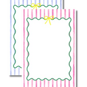 May include: Two blank stationery cards with a watercolor design. One card has pink and blue vertical stripes, while the other has pink stripes. Both cards have a green scalloped border and a yellow bow at the top.