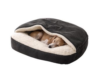 Cama cueva tranquilizadora para perros medianos: madriguera cerrada de piel sintética