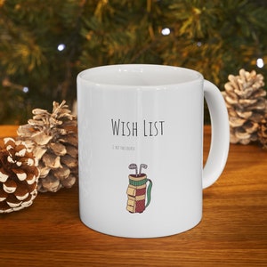 Weihnachts-Kaffee-Tasse mit Golf-Wunschliste Hit das Platz-Design bereit für diese Weihnachtszeit