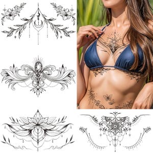 May include: Black and white temporary tattoo designs. The image shows several intricate floral and ornamental tattoo designs, including a lotus flower, a crescent moon, and a mandala. The designs are displayed on a white background and on a person's body.