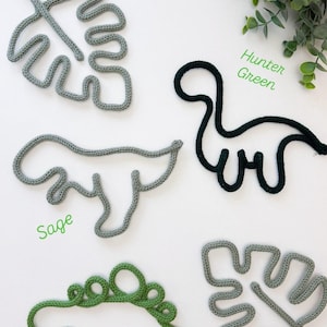Arte de pared de alambre de ganchillo con temática de dinosaurios: decoración infantil hecha a mano. T-Rex, huella de dinosaurio, hoja de monstera.