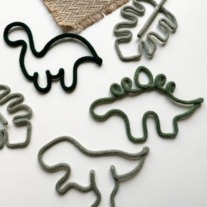 Dinosaur Themed Crocheted Wire Wall Art – Handmade Nursery Decor. T-Rex, Dino footprint, Monstera leaf.