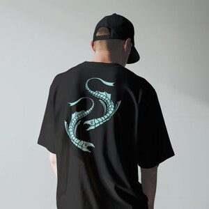 May include: Black t-shirt with a light blue illustration of two stylized fish on the back. The fish design has a skeletal appearance. The person in the image is wearing a black baseball cap.