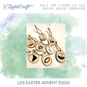 May include: Wooden Easter advent eggs with various laser-cut designs and text, including "Easter Sunday," "Monday," "Wednesday," "Saturday," "Thursday," "Good Friday," and "Tuesday." Each egg is strung with twine. The image also includes the text "LDS Easter Advent Eggs."