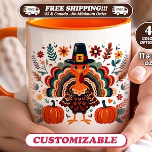 May include: White ceramic mug with an orange interior and handle, featuring a Thanksgiving turkey design. The turkey wears a pilgrim hat and is surrounded by floral and pumpkin illustrations. The mug is available in 11 & 15 oz sizes and is customizable.
