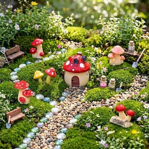 May include: A miniature garden scene featuring a central red and white mushroom-shaped house, surrounded by various small mushroom figurines, two tiny wooden benches, small glass jars, a pebble path, and clear glass stones set in green moss.
