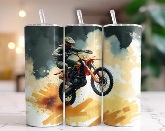 May include: Three stainless steel tumblers with a motocross design. The design features a rider on an orange and black dirt bike mid-air, with the number 12 on the bike. The background has a yellow and orange explosion effect.
