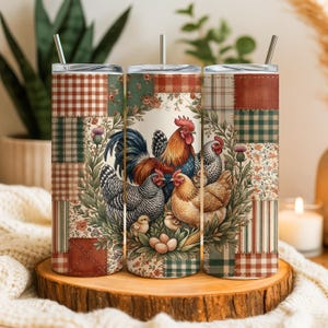 May include: A set of three stainless steel insulated tumblers with lids and straws. Each tumbler features a patchwork design with a rooster and hen illustration. The color palette includes red, green, and beige.