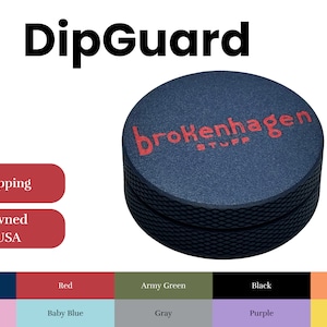 May include: A black and blue round container with the text "DipGuard" and "brokenhagen stuff" in red lettering.