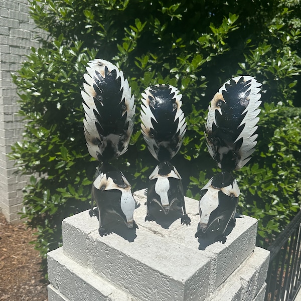 Gambá bebê, decoração de jardim feita com metal reciclado