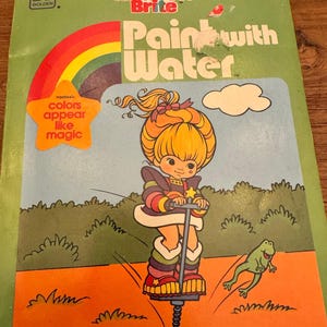 Vernice vintage Rainbow Brite Bright Golden Bks con acqua, 1984