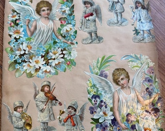 Mixed lot of vintage die cut cutout Pictures on thvintage scrap book paper