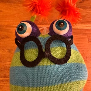 The Puppet Company Dylan Knitted Hand Puppet Toy