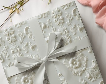 Papier cadeau floral crème pour anniversaires, mariages et occasions spéciales, style gaufré plat