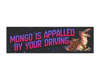 May include: A rectangular sticker featuring the text "MONGO IS APPALLED BY YOUR DRIVING" in pink and blue. A cartoon dinosaur with a saddle is on the right side of the sticker, with its mouth open.