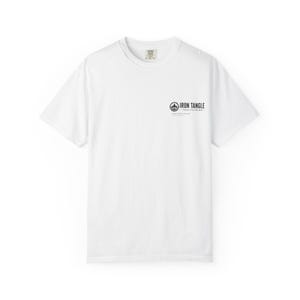 May include: A white crew neck t-shirt with the text "IRON TANGLE" printed in black on the right chest. The shirt has a small tag at the back of the neck. The t-shirt is made of a soft, comfortable material.