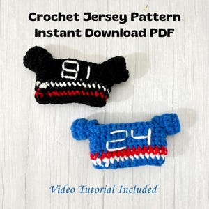 May include: Two miniature crochet jerseys, one black with the number 81 and the other blue with the number 24. Both jerseys have red and white accents. The text "Crochet Jersey Pattern Instant Download PDF" and "Video Tutorial Included" are also visible.