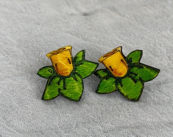 Elevate your style with our  stud earrings, featuring delicate leaves and vibrant flowers.