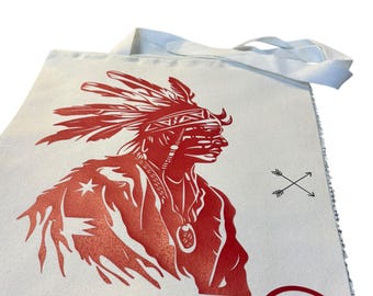 Bolso de lona con estampado de jefe nativo americano, diseño gráfico rojo.