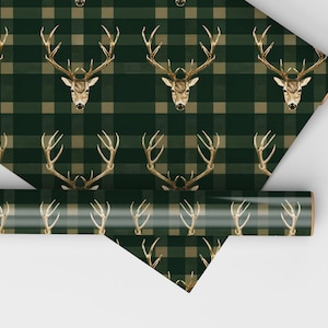 May include: Green and brown plaid wrapping paper with a repeating pattern of gold deer heads.