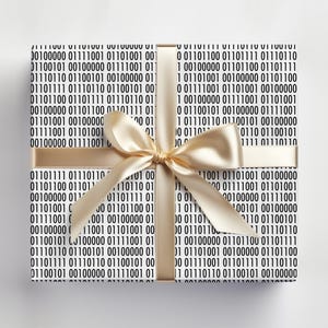 May include: A wrapped present with a white background and a gold satin ribbon. The wrapping paper is white with a repeating pattern of black binary code. The bow is tied in a classic style.