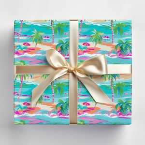 May include: A gift box wrapped in blue and pink tropical beach themed wrapping paper with a gold bow.