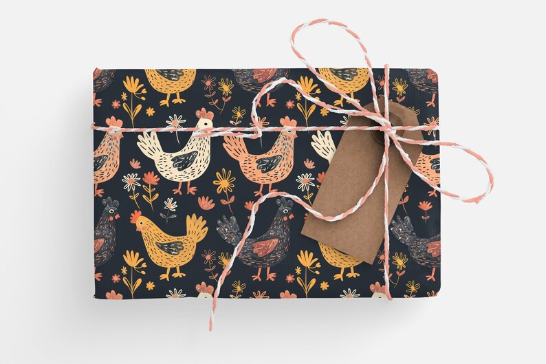 May include: A gift wrapped in dark blue wrapping paper with a pattern of colorful chickens and flowers. The gift is tied with white and pink twine and has a brown paper tag.